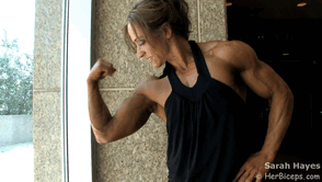 Female bodybuilder huge bicep flex