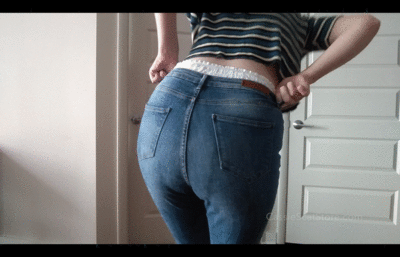 Girlfriend casually wetting jeans making cereal