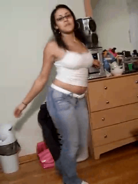Sexy latina dances while getting