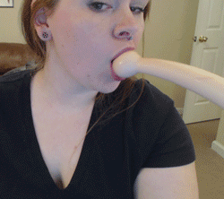 Girl doing deepthroat long dildo