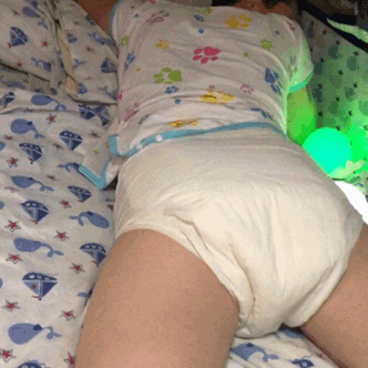 Girl wearing diaper under clothes
